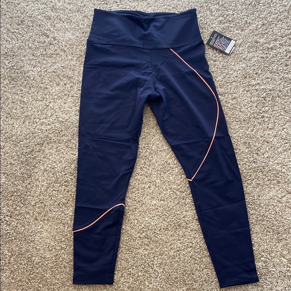 Onzie yoga Hyper Beam Midi Length 
Blue and pink trim 
BNWT 
Size S/M.